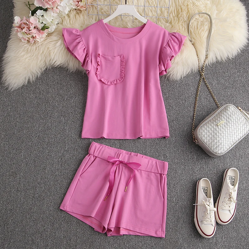 ALPHALMODA New Summer Ruffled Sleeve Pleated Pocket Women Cute 2pcs Tshirt Shorts Suit Solid Color Sweet Girls Lounge Wear Set
ALPHALMODA New Summer Ruffled Sleeve Pleated Pocket Women Cute 2pcs Tshirt Shorts Suit Solid Color Sweet Girls Lounge Wear Set