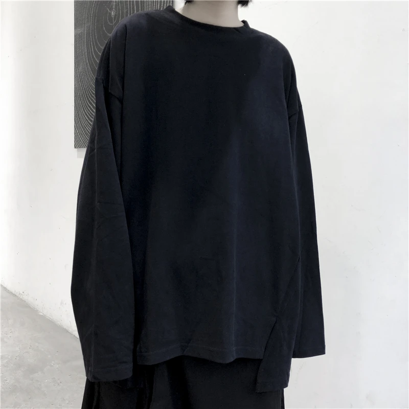New women's autumn irregular slit design round collar solid color long sleeve T-shirt loose and casual
New women's autumn irregular slit design round collar solid color long sleeve T-shirt loose and casual