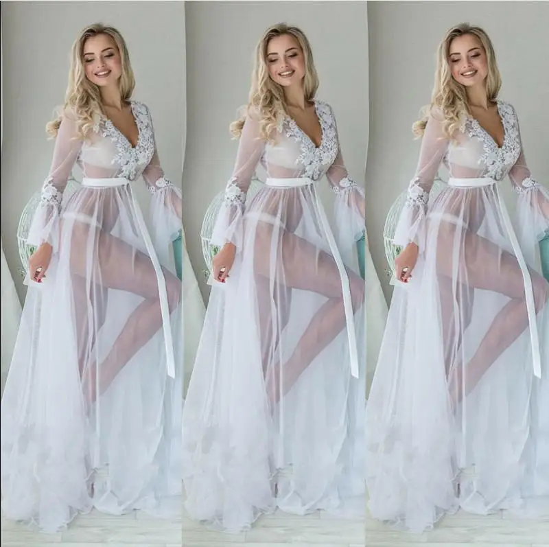 Summer women's dress sexy V-neck thin super fairy net yarn beach seaside vacation white long skirt
Summer women's dress sexy V-neck thin super fairy net yarn beach seaside vacation white long skirt