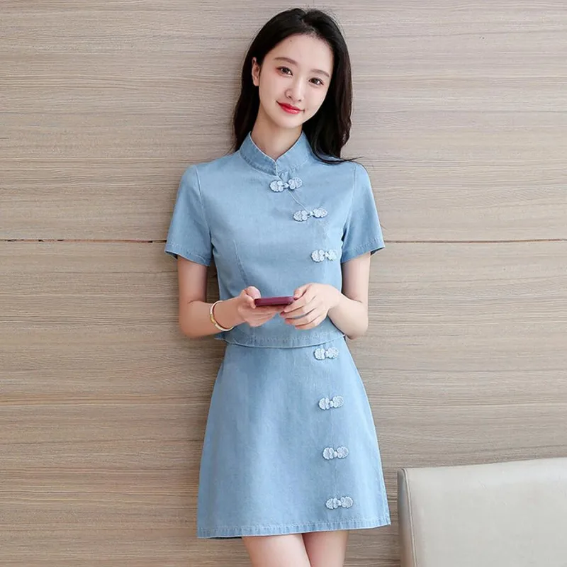 New Fashion Denim Two-Piece Skirt Women Short Sleeve Tops + Retro Disc Button Cheongsam Skirt Set q371
New Fashion Denim Two-Piece Skirt Women Short Sleeve Tops + Retro Disc Button Cheongsam Skirt Set q371