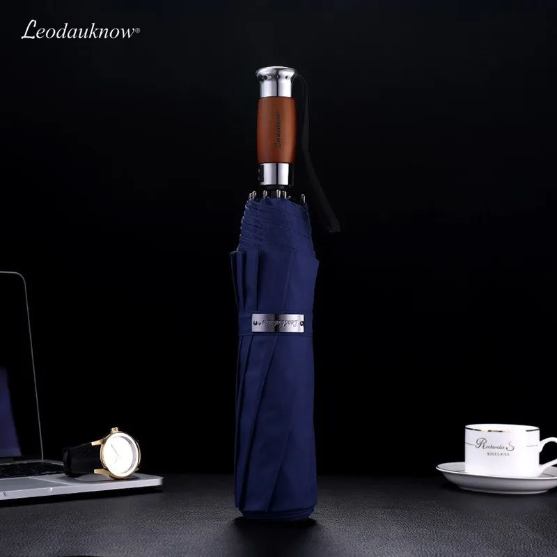 Leodauknow Classical Style Automatic 3 Folding Wood Handle Large Face Men Business 10k Windproof Umbrella High quality
Leodauknow Classical Style Automatic 3 Folding Wood Handle Large Face Men Business 10k Windproof Umbrella High quality