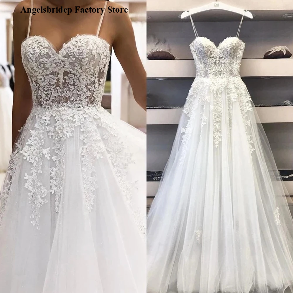 Angelsbridep A-Line Wedding Dress Spaghetti Straps Vintage Lace Appliques Beaded Off White Tulle Mariage Long Bridal Dress HOT
Angelsbridep A-Line Wedding Dress Spaghetti Straps Vintage Lace Appliques Beaded Off White Tulle Mariage Long Bridal Dress HOT