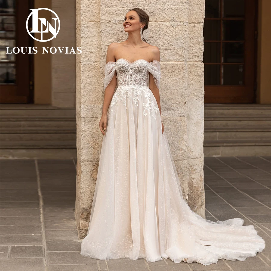 LOUIS NOVIAS Свадебное платье трапециевидной формы, сексуальное элегантное свадебное платье с открытыми плечами и открытой спиной, струящееся блестящее свадебное платье в горошек
LOUIS NOVIAS Свадебное платье трапециевидной формы, сексуальное элегантное свадебное платье с открытыми плечами и открытой спиной, струящееся блестящее свадебное платье в горошек