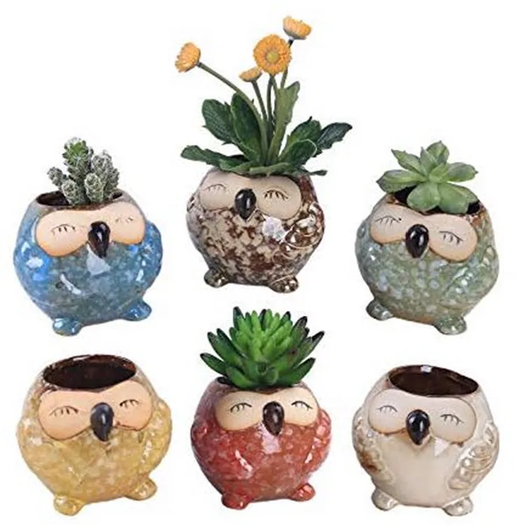 Ceramic flowerpot with glazed cat's-eye owl and lovely fleshy thumb flowerpot flower pot office decor
Ceramic flowerpot with glazed cat's-eye owl and lovely fleshy thumb flowerpot flower pot office decor