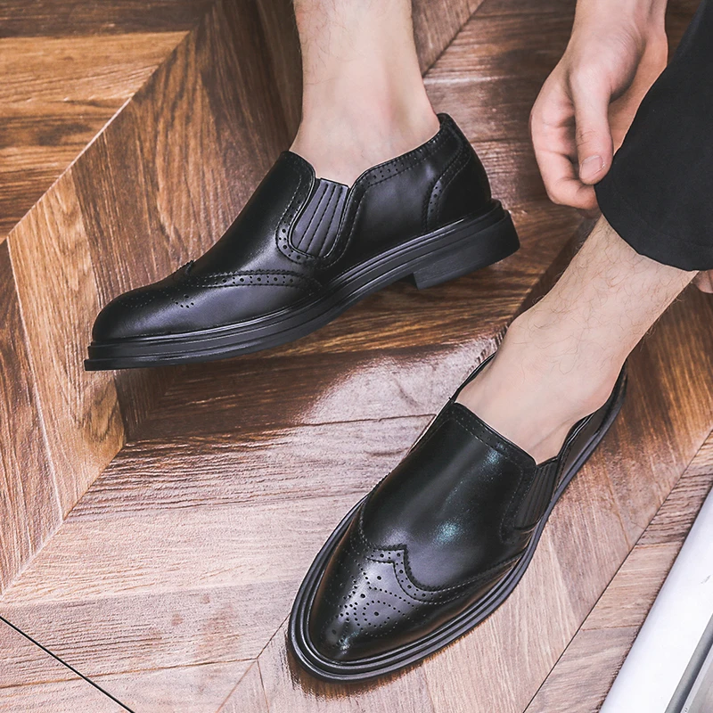British Fashion Slip-On Men Loafers Comfortable Soft Leather Mens Formal Dress Shoes Pointed Toe Business Wedding Brogue Shoes
British Fashion Slip-On Men Loafers Comfortable Soft Leather Mens Formal Dress Shoes Pointed Toe Business Wedding Brogue Shoes