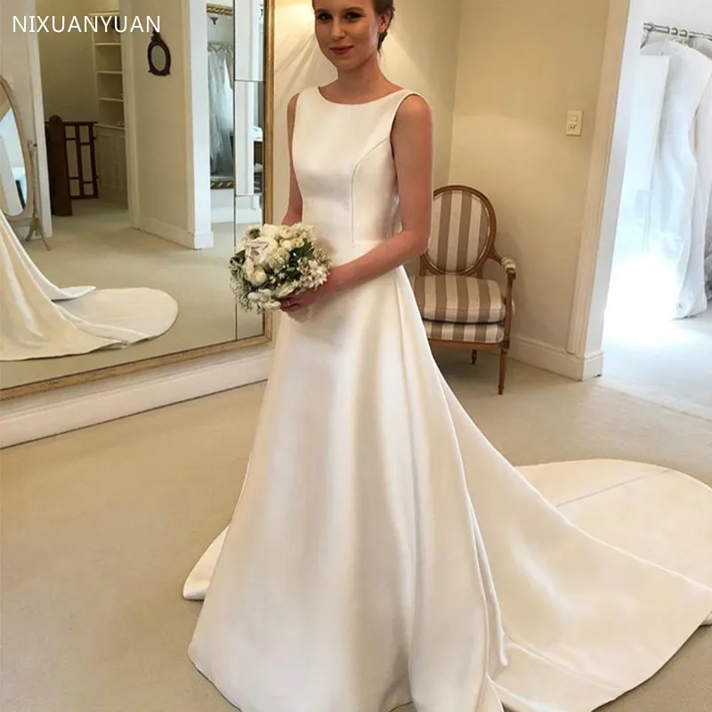 Boho A-line Jewel Backless Wedding Dress Chapel Train Satin Bridal Dress Bow on Back Country Wedding Bride Dresses
Boho A-line Jewel Backless Wedding Dress Chapel Train Satin Bridal Dress Bow on Back Country Wedding Bride Dresses