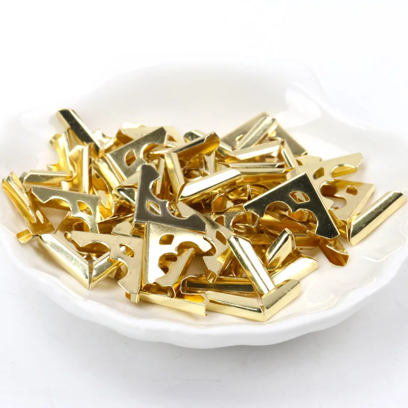 40Pcs Metal Book Corner Cantoneira Trilateral Albums Menus Folders Box Corner Protectors Frame Decor Gold 16x16x2.5mm
40Pcs Metal Book Corner Cantoneira Trilateral Albums Menus Folders Box Corner Protectors Frame Decor Gold 16x16x2.5mm