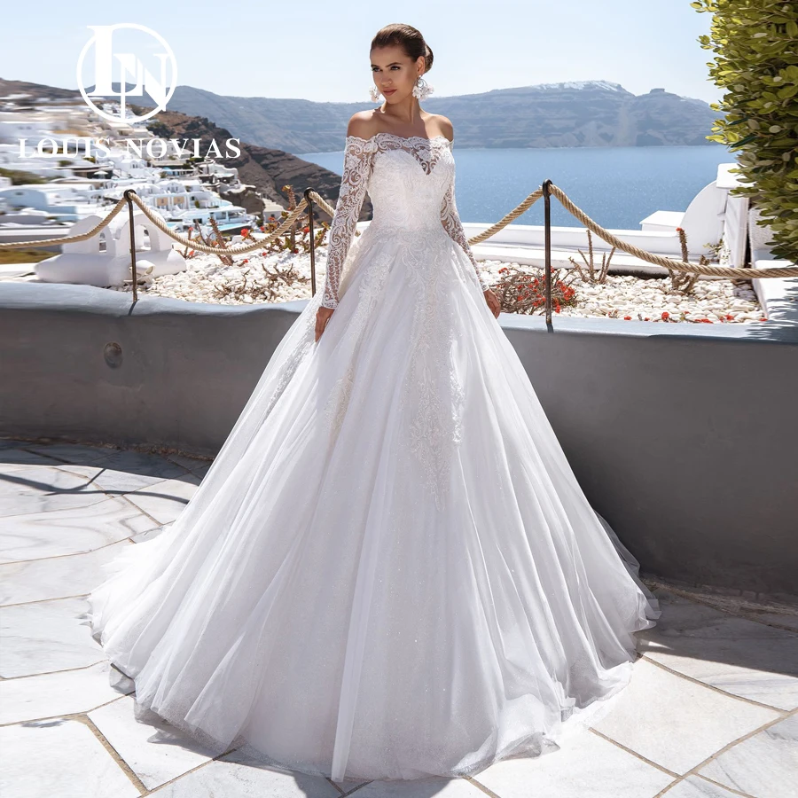 LOUIS NOVIAS Свадебное платье трапециевидной формы с длинными рукавами, блестящее свадебное платье с блестками и аппликацией, свадебное платье с вырезом лодочкой, Vestidos De Novia
LOUIS NOVIAS Свадебное платье трапециевидной формы с длинными рукавами, блестящее свадебное платье с блестками и аппликацией, свадебное платье с вырезом лодочкой, Vestidos De Novia