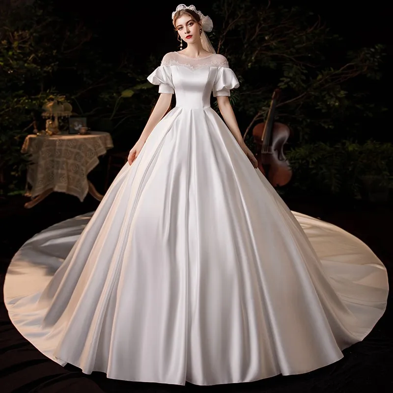 2024 New Pure White Luxury Satin Wedding Dress With Sweep Train Simple O Neck Short Sleeve Custom Made Slim Bridal Dress
2024 New Pure White Luxury Satin Wedding Dress With Sweep Train Simple O Neck Short Sleeve Custom Made Slim Bridal Dress