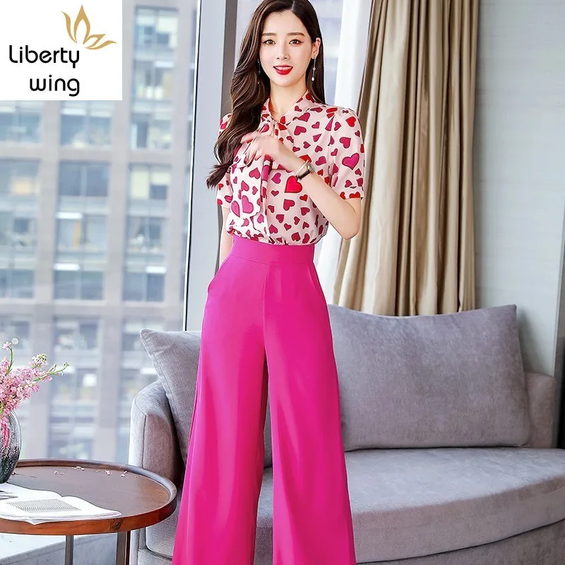 New Brand Ensemble Femme 2 Pieces Love Print Short Sleeve O-Neck Lace Up Chiffon Shirts Solid Ankle Length Wide Leg Pants
New Brand Ensemble Femme 2 Pieces Love Print Short Sleeve O-Neck Lace Up Chiffon Shirts Solid Ankle Length Wide Leg Pants