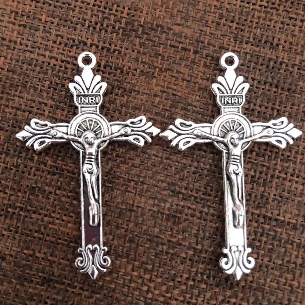 50pcs a pack one hole antique silver alloy cross 
50pcs a pack one hole antique silver alloy cross