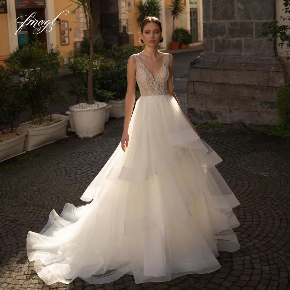 Fmogl Vestidos De Noiva Sexy Illusion V Neck Ruffles Wedding Dresses Luxury Sweep Train Beaded Pearls A Line Bride Gown
Fmogl Vestidos De Noiva Sexy Illusion V Neck Ruffles Wedding Dresses Luxury Sweep Train Beaded Pearls A Line Bride Gown
