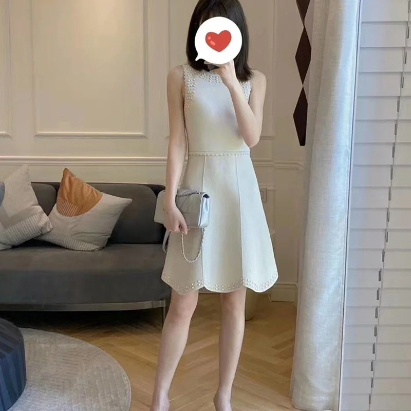 Sleeveless Elegant Knitted Dress Women Fashion Rivets O Neck Pullover Sundress 2022 Summer French Vintage A Line Dress Female
Sleeveless Elegant Knitted Dress Women Fashion Rivets O Neck Pullover Sundress 2022 Summer French Vintage A Line Dress Female