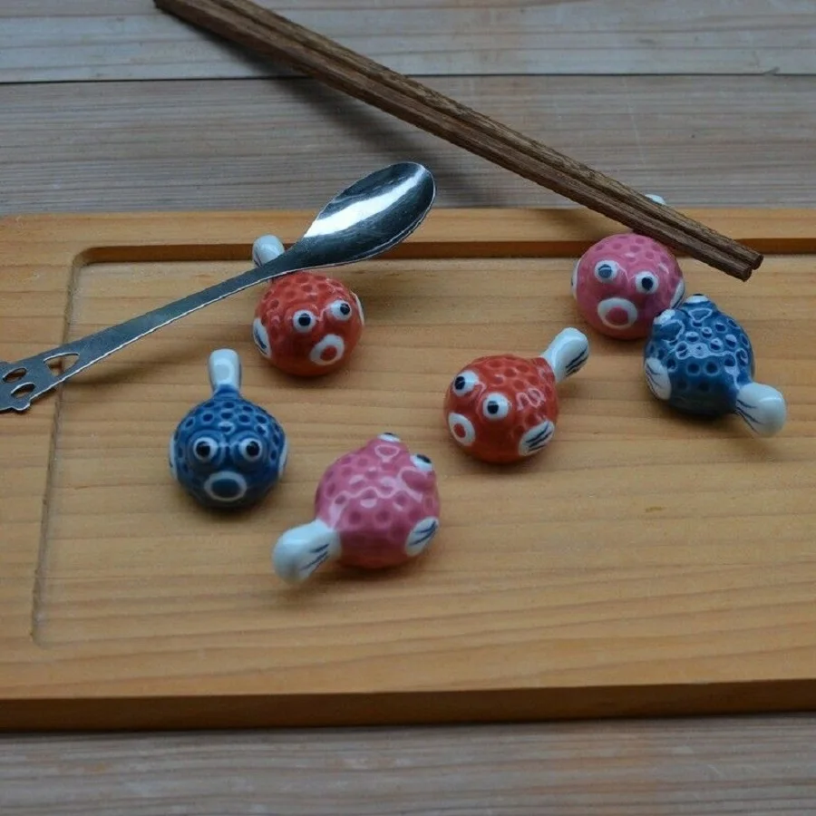 Pack of 7 pcs Cute Puffer Fish Ceramic Chopsticks Stand Holder Japanese Style Hand-painted
Pack of 7 pcs Cute Puffer Fish Ceramic Chopsticks Stand Holder Japanese Style Hand-painted