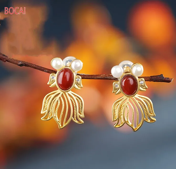 Real S925 sterling silver gold-plated inlaid southern red agate earrings, ladies goldfish simple and creative earrings
Real S925 sterling silver gold-plated inlaid southern red agate earrings, ladies goldfish simple and creative earrings