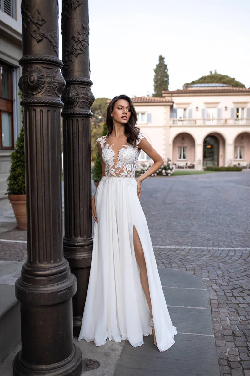 2024 Sexy Beach Boho Wedding Dress with High Slit Cap Sleeve See-through Applique Chiffon Wedding Gowns свадебное платье
2024 Sexy Beach Boho Wedding Dress with High Slit Cap Sleeve See-through Applique Chiffon Wedding Gowns свадебное платье