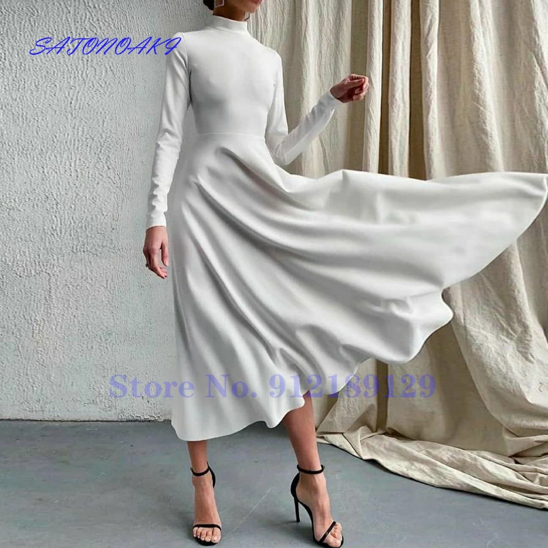 Vestidos De Novia Vintage Ivory A-Line Long Sleeve Satin High Neck Wedding Dress Tea Length Bridal Gown for Women Robe De Mariée
Vestidos De Novia Vintage Ivory A-Line Long Sleeve Satin High Neck Wedding Dress Tea Length Bridal Gown for Women Robe De Mariée