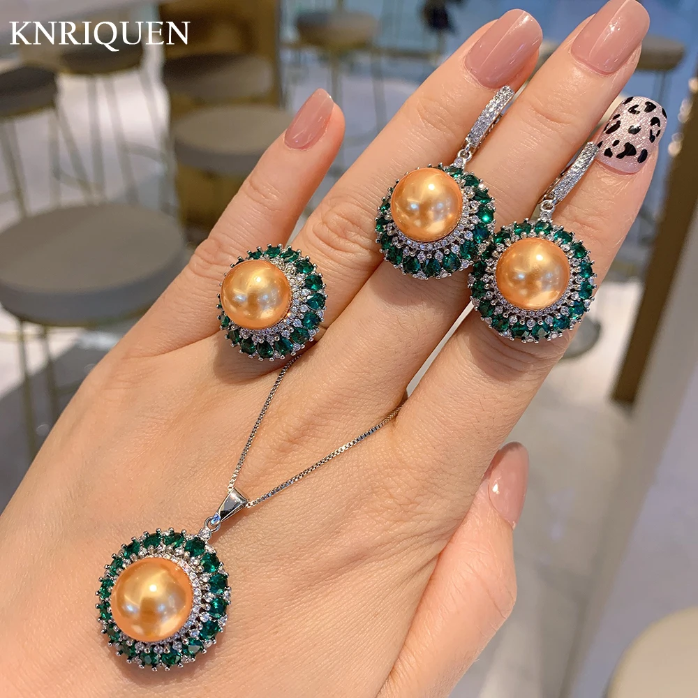Retro Luxury 12mm Gold Color Big Pearl Emerald Gemstone Pendant Necklace Ring Earrings Wedding Jewelry Sets Anniversary Gifts
Retro Luxury 12mm Gold Color Big Pearl Emerald Gemstone Pendant Necklace Ring Earrings Wedding Jewelry Sets Anniversary Gifts