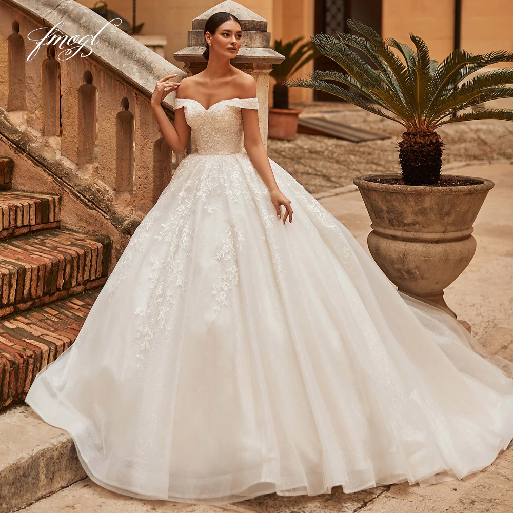 Fmogl Sexy Boat Neck Backless Lace Ball Gown Wedding Dresses Luxury Appliques Beaded Court Train Vintage Bridal Gowns
Fmogl Sexy Boat Neck Backless Lace Ball Gown Wedding Dresses Luxury Appliques Beaded Court Train Vintage Bridal Gowns