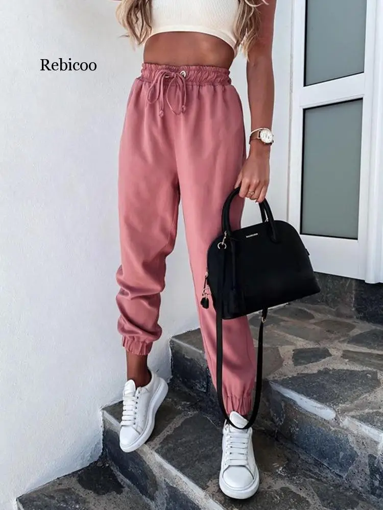 Solid color lace up women's sports pants Women jogger loose harem pants Home wear pink running sweatpants summer 2020
Solid color lace up women's sports pants Women jogger loose harem pants Home wear pink running sweatpants summer 2020