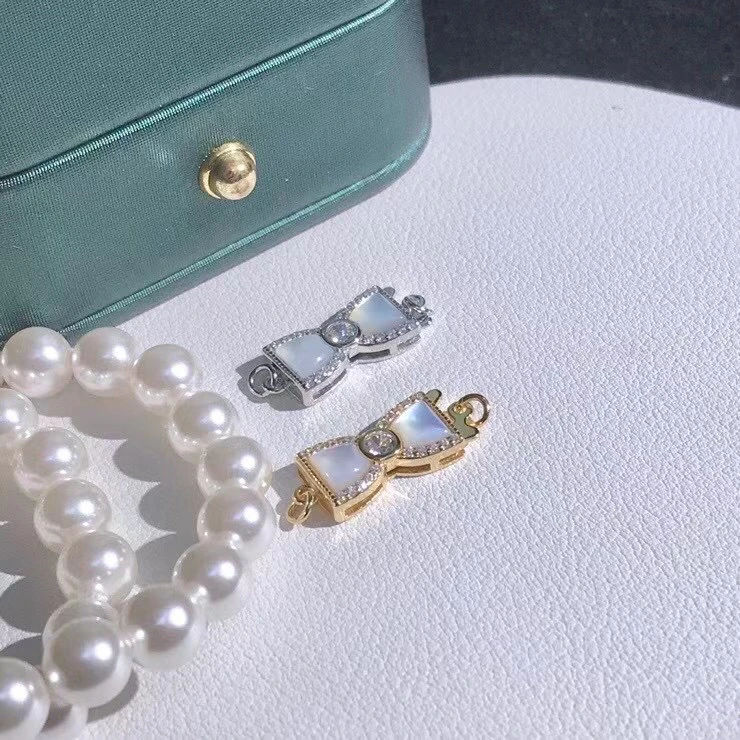 Nice Quality S925 Sterling Silver Bow Knot Shape Pendant Necklace Bracelet Clasp Hook NO PEARLS 5pcs/lot
Nice Quality S925 Sterling Silver Bow Knot Shape Pendant Necklace Bracelet Clasp Hook NO PEARLS 5pcs/lot
