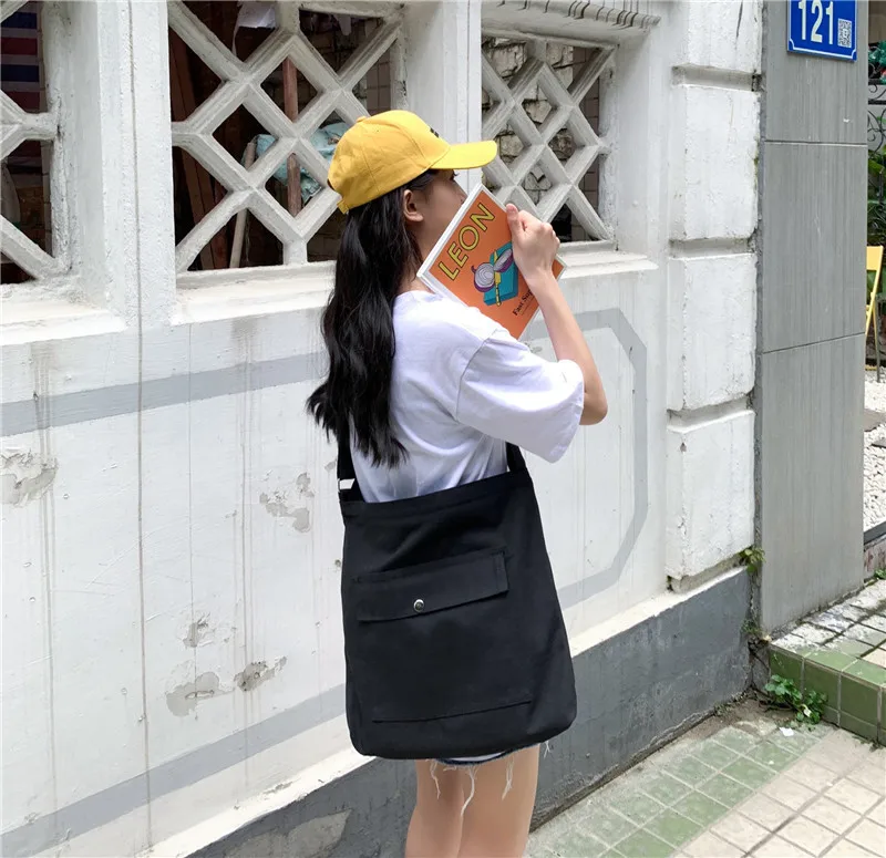 Black canvas bag female 2020 new student schoolbag college crossbody bag large capacity wholesale reusable grocery bags
Black canvas bag female 2020 new student schoolbag college crossbody bag large capacity wholesale reusable grocery bags