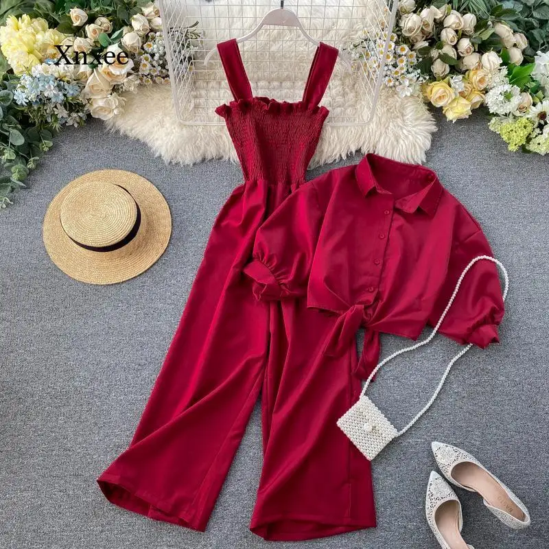Summer Women's Two-Piece Suit New Solid Color Sling Folding Wide-Leg Jumpsuit Ladies Lapel Short-Sleeved Shirt Female Trend
Summer Women's Two-Piece Suit New Solid Color Sling Folding Wide-Leg Jumpsuit Ladies Lapel Short-Sleeved Shirt Female Trend