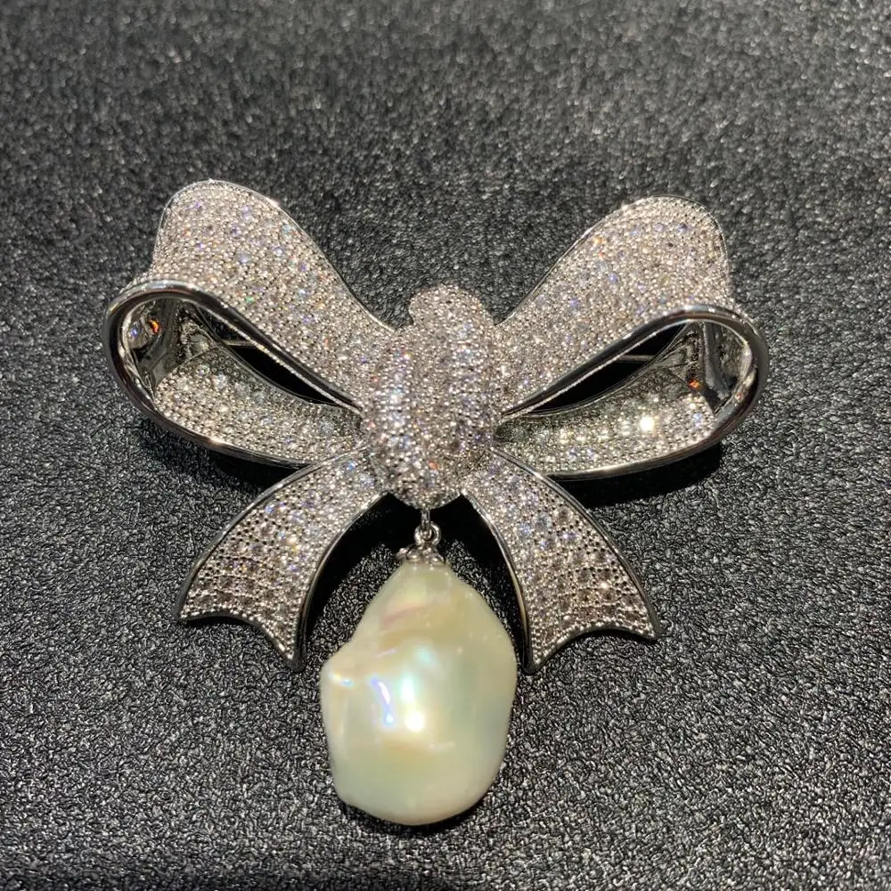 baroque natural fresh water pearl brooch copper with cubic zircon bowknot fashion women jewelry free shipping
baroque natural fresh water pearl brooch copper with cubic zircon bowknot fashion women jewelry free shipping