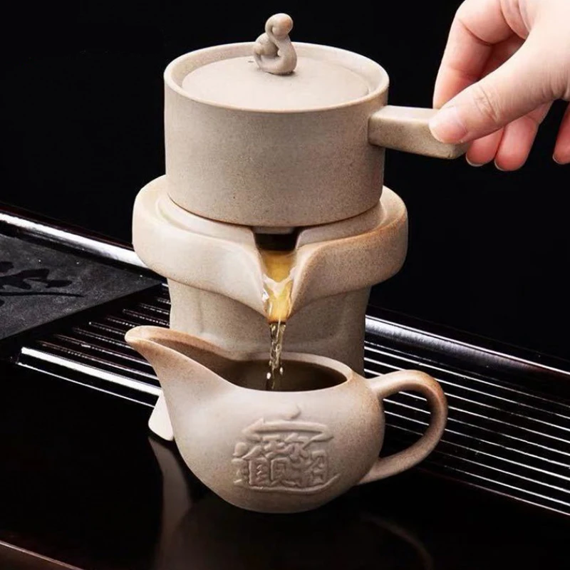 Creative Ceramic Automatic Tea Set Anti-scalding Design Rotating Teapot Chinese Kungfu Stone Grinding Tea Set Tea Maker
Creative Ceramic Automatic Tea Set Anti-scalding Design Rotating Teapot Chinese Kungfu Stone Grinding Tea Set Tea Maker