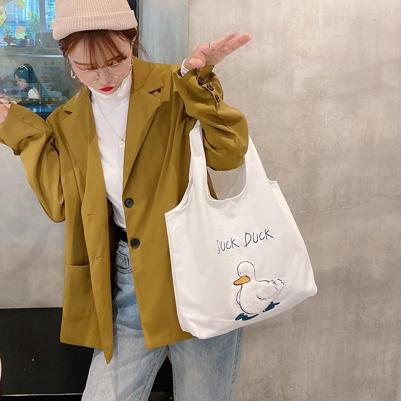 Original cute duck cartoon tote bag student female large capacity canvas bag shoulder bag shopping bag foldable tote bag cotton
Original cute duck cartoon tote bag student female large capacity canvas bag shoulder bag shopping bag foldable tote bag cotton