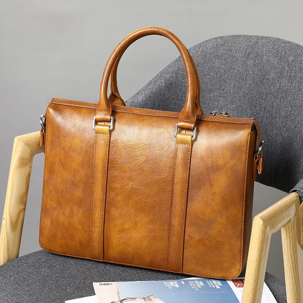 Retro leather men's bag trendy rub color handbag fashion tree cream leather 14 inch briefcase
Retro leather men's bag trendy rub color handbag fashion tree cream leather 14 inch briefcase