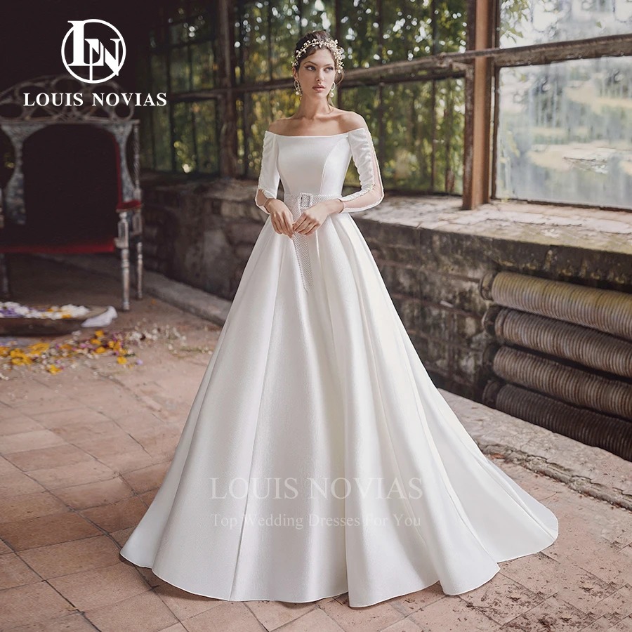 LOUIS NOVIAS Свадебные платья трапециевидной формы для женщин, простое шикарное атласное свадебное платье с вырезом лодочкой и длинными рукавами на молнии, Vestidos De Novia
LOUIS NOVIAS Свадебные платья трапециевидной формы для женщин, простое шикарное атласное свадебное платье с вырезом лодочкой и длинными рукавами на молнии, Vestidos De Novia
