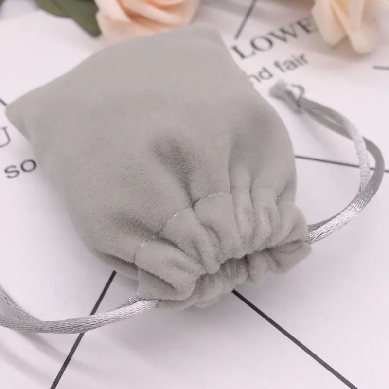 High quality drawstring velvet bag mobile phone accessories gift jewelry pouch custom and wholesale
High quality drawstring velvet bag mobile phone accessories gift jewelry pouch custom and wholesale