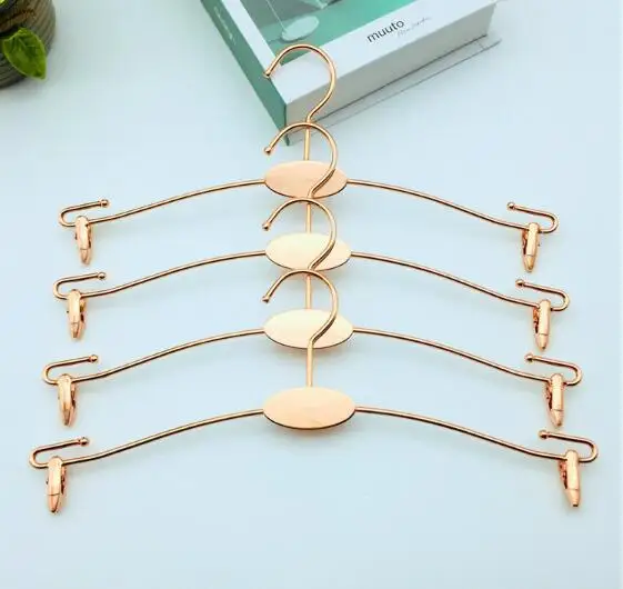 Rose Gold Metal Clothes Hanger with Clothespins Clip Bra Underwear Lingerie Panties Drying Rack Hanger Hook 
Rose Gold Metal Clothes Hanger with Clothespins Clip Bra Underwear Lingerie Panties Drying Rack Hanger Hook