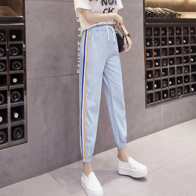 Women Summer Ankle Length Elastic Waist Jeans Casual Streetwear Side Striped Harem Pants Trousers Ladies Joggers Denim Pants
Women Summer Ankle Length Elastic Waist Jeans Casual Streetwear Side Striped Harem Pants Trousers Ladies Joggers Denim Pants