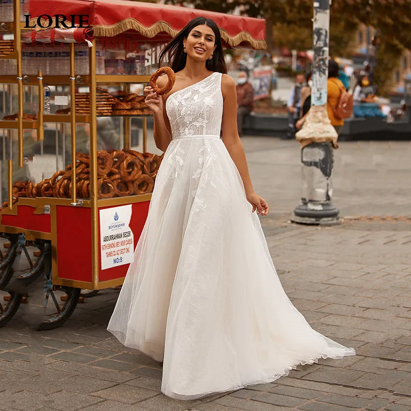 LORIE Boho Wedding Dresses A Line One Shoulder Ivory Lace Appliques Beach Bride Dresses vestido de casamento
LORIE Boho Wedding Dresses A Line One Shoulder Ivory Lace Appliques Beach Bride Dresses vestido de casamento