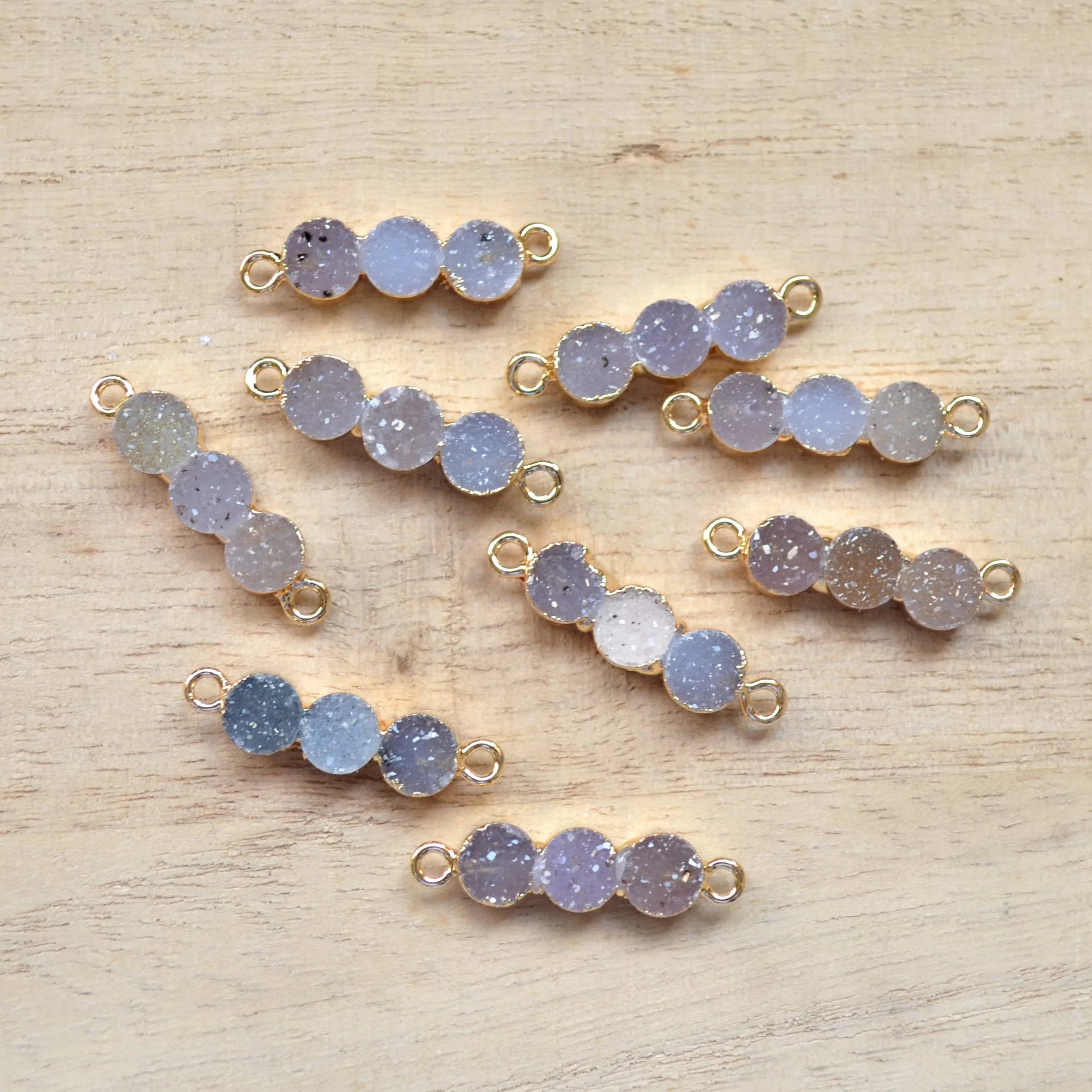 New druzy connector pendant ,crystal agates connector with Electroplated gold edge
New druzy connector pendant ,crystal agates connector with Electroplated gold edge