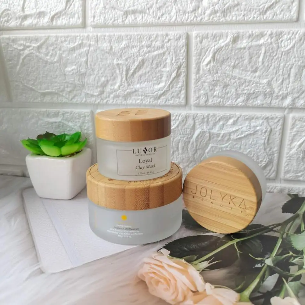 Eco Friendly Custom Logo 5g 15g 30g 50g 100g Empty White Matt Frosted Wooden Bamboo Lid Cap Glass Face Cream Jar Custom Logo
Eco Friendly Custom Logo 5g 15g 30g 50g 100g Empty White Matt Frosted Wooden Bamboo Lid Cap Glass Face Cream Jar Custom Logo