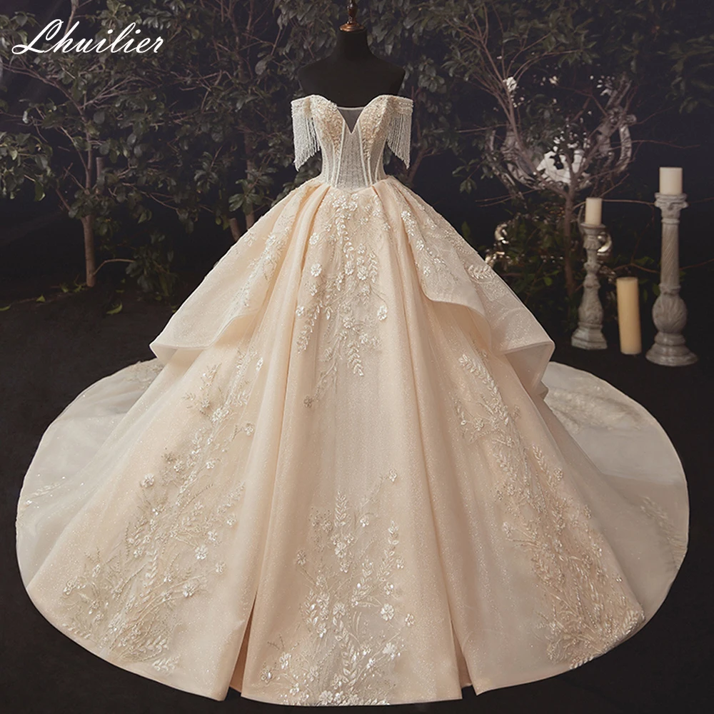 Lhuilier Customized Boat Neck Shiny Ball Gown Wedding Dresses Beaded Floor Length Bridal Gowns Cathedral Train with Tassels
Lhuilier Customized Boat Neck Shiny Ball Gown Wedding Dresses Beaded Floor Length Bridal Gowns Cathedral Train with Tassels