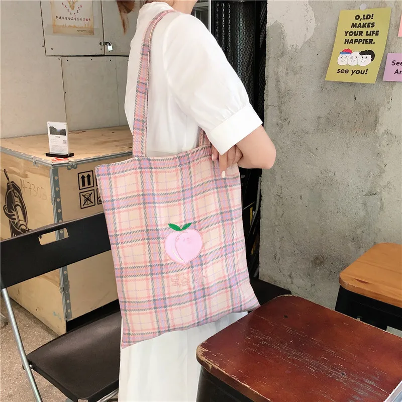 Peach duck pear plaid shoulder bag ins art school girl soft cute canvas bag tote bag cotton canvas handbags shopping bag
Peach duck pear plaid shoulder bag ins art school girl soft cute canvas bag tote bag cotton canvas handbags shopping bag