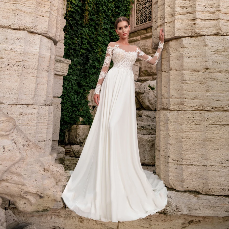 Sexy Bohemian Wedding Dress Sheer O Neck Long Sleeves Wedding Gowns Lace Applique Chiffon Bride Dresses Robe De Mariage
Sexy Bohemian Wedding Dress Sheer O Neck Long Sleeves Wedding Gowns Lace Applique Chiffon Bride Dresses Robe De Mariage