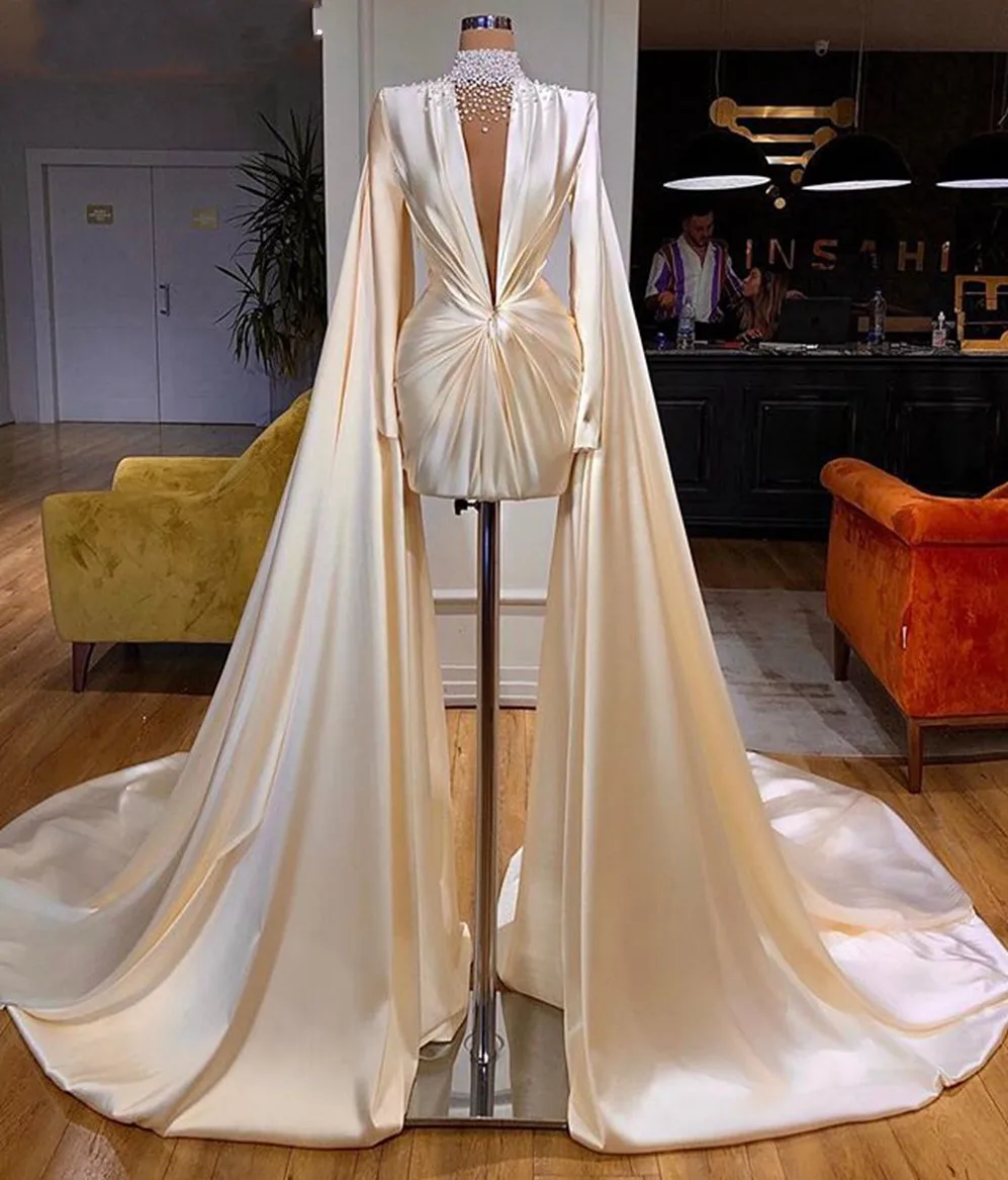 Modern Evening Dress 2025 Sheer High Neck Long Sleeve Pearls Ivory Satin Dubai Arabic Short Formal Prom Gowns With Long Shawl
Modern Evening Dress 2025 Sheer High Neck Long Sleeve Pearls Ivory Satin Dubai Arabic Short Formal Prom Gowns With Long Shawl