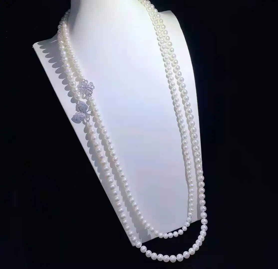 Micro inlaid zircon butterfly accessories white freshwater pearl necklace tassel pendant long sweater chain 75-85cm
Micro inlaid zircon butterfly accessories white freshwater pearl necklace tassel pendant long sweater chain 75-85cm