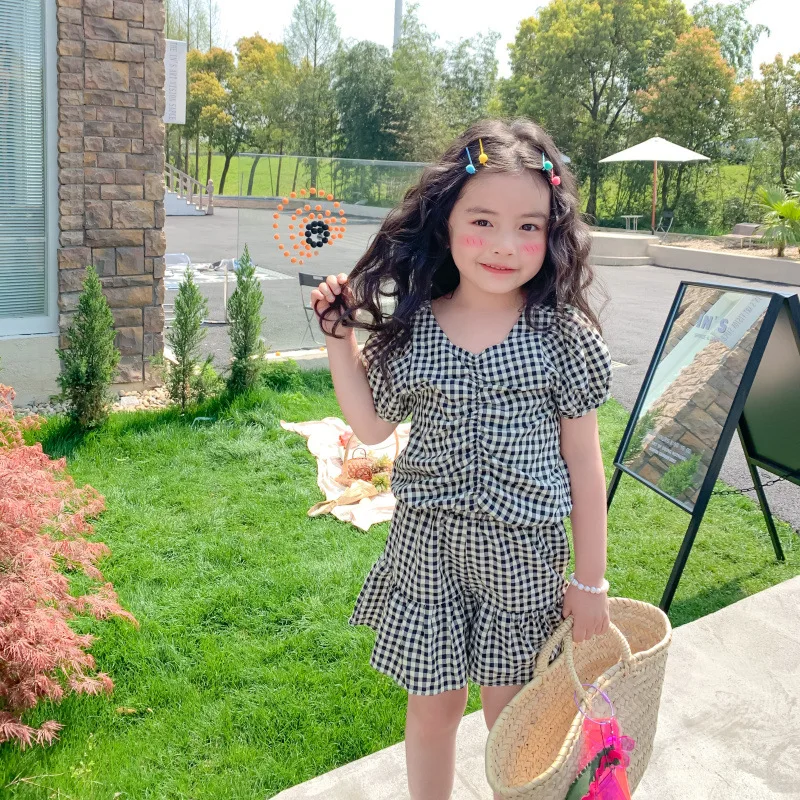 2021 Baby Girl Fashion Clothing Set Cute Bow Plaid T-shirt top + shorts girls Clothes Sets Children Party Birthday Wear
2021 Baby Girl Fashion Clothing Set Cute Bow Plaid T-shirt top + shorts girls Clothes Sets Children Party Birthday Wear
