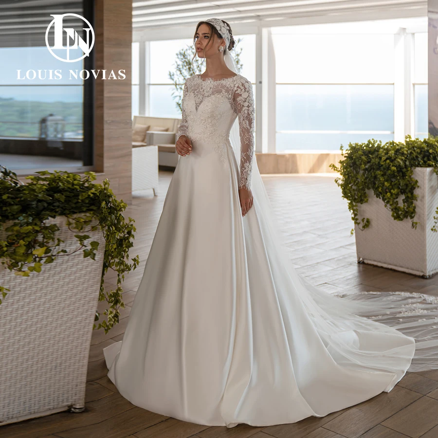 LOUIS NOVIAS A-Line Wedding Dress Sexy Glamorous Lace Long Sleeve Scoop Bride Button Satin Beaded Embroidery Vestidos De Novia
LOUIS NOVIAS A-Line Wedding Dress Sexy Glamorous Lace Long Sleeve Scoop Bride Button Satin Beaded Embroidery Vestidos De Novia