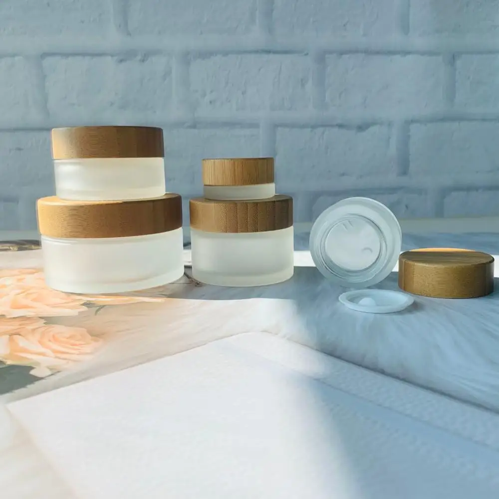 Empty Cream Container jar 5g 15g 30g 50g 100g Frosted Clear Glass Cream Jars With Bamboo Lid Custom Logo Skin Care Cream Jar
Empty Cream Container jar 5g 15g 30g 50g 100g Frosted Clear Glass Cream Jars With Bamboo Lid Custom Logo Skin Care Cream Jar