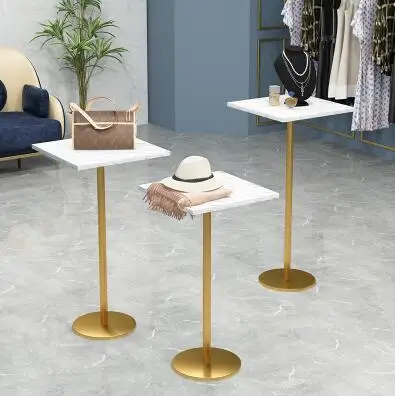 Northern Europe floor round display shelf imitation marble iron high and low shelf clothing store shoe bag display shelf
Northern Europe floor round display shelf imitation marble iron high and low shelf clothing store shoe bag display shelf