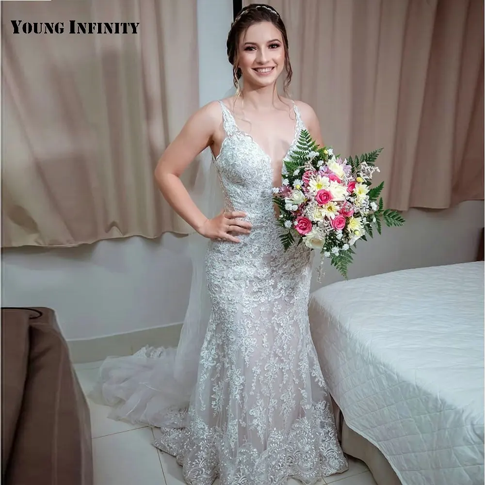 Hot Sale Lace Appliques Wedding Dress 2021 Tulle V Neck Spaghetti Starps Button Sweep Train Floor Length Mermaid Bridal Gown
Hot Sale Lace Appliques Wedding Dress 2021 Tulle V Neck Spaghetti Starps Button Sweep Train Floor Length Mermaid Bridal Gown