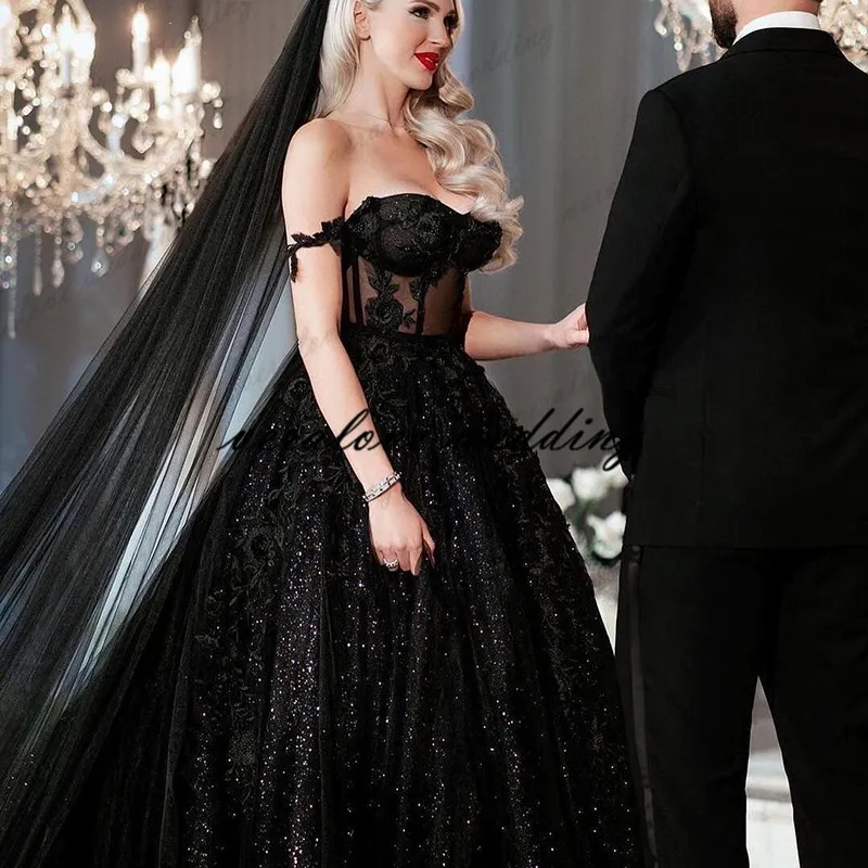 Robe De Mariee Black Sequined Wedding Dress illusion Off the Shoulder Lace Appliques Wedding Bridal Gowns
Robe De Mariee Black Sequined Wedding Dress illusion Off the Shoulder Lace Appliques Wedding Bridal Gowns