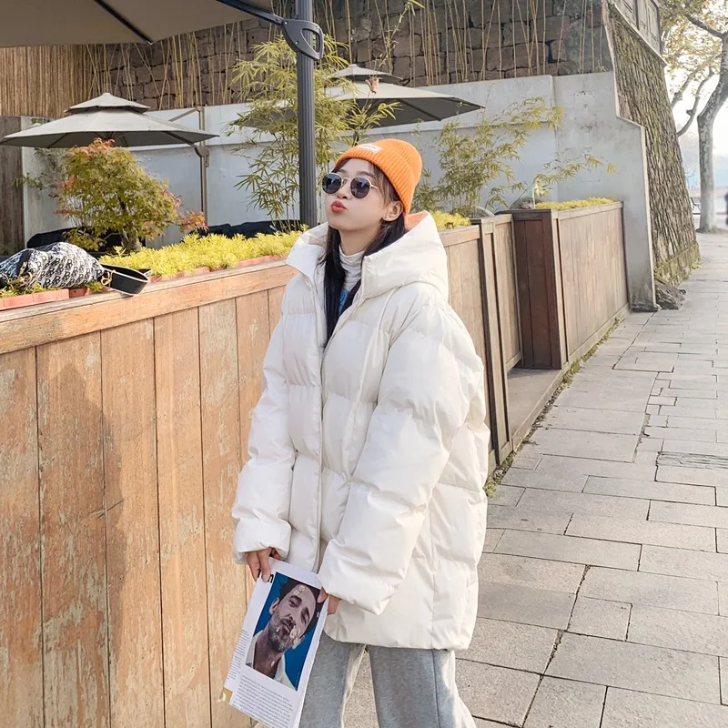 2025 Winter Warm Tops Women Hooded Down Cotton Jacket Mid-length Female Parkas Casual Loose Outwear Korean padded Coat Clothing
2025 Winter Warm Tops Women Hooded Down Cotton Jacket Mid-length Female Parkas Casual Loose Outwear Korean padded Coat Clothing